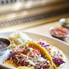 Blanco Cocina and Cantina signature dishes Nachos Con Queso BlancoCarne AsadaChicken Tinga